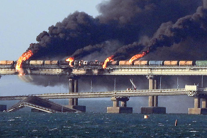 Black smoke billows from a fire on the Kerch bridge that links Crimea to Russia after an explosion on Saturday.