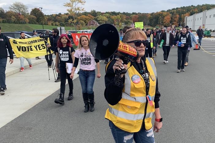 Organizer Heather Goodall, who works at Amazon's warehouse near Albany, N.Y., leads supporters of the Amazon Labor Union in a march on Oct. 10.