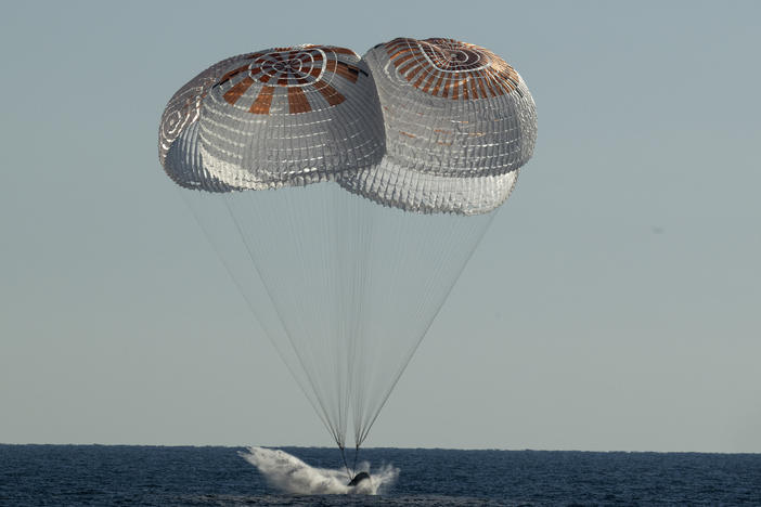 The SpaceX Crew Dragon Freedom capsule splashes down Friday in the Atlantic Ocean off Florida in a return trip from the International Space Station.
