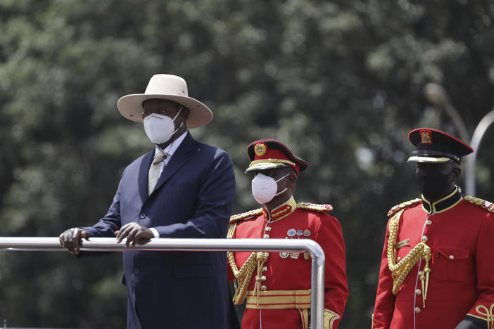 Ugandan President Yoweri Museveni inspects the guard of honour, during the 60th Independence Anniversary Celebrations, in Kololo, Uganda, Sunday Oct. 9, 2022.