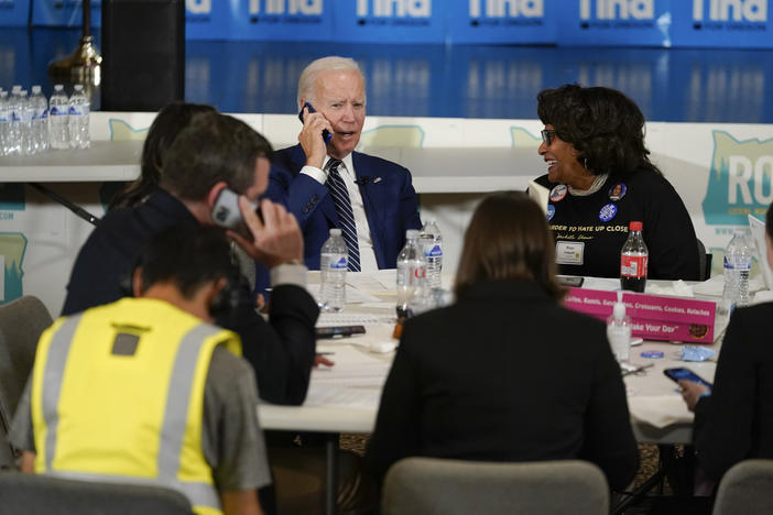 President Biden works the phones during a grassroots volunteer event with the Oregon Democrats at the SEIU Local 49 in Portland, Ore., on Friday.