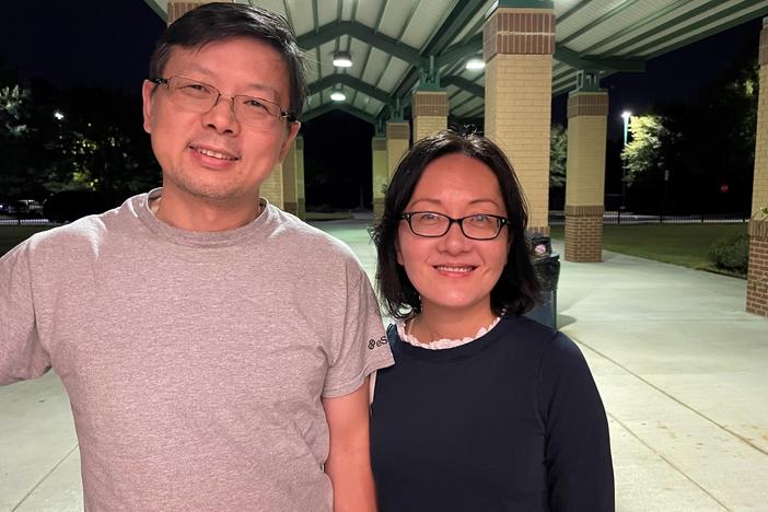 Wei Kang Ding and Judy Zhu outside of a candidate debate hosted by high school students on Sept. 28. in Johns Creek, Ga. Ding and Zhu say they are still doing their election research.