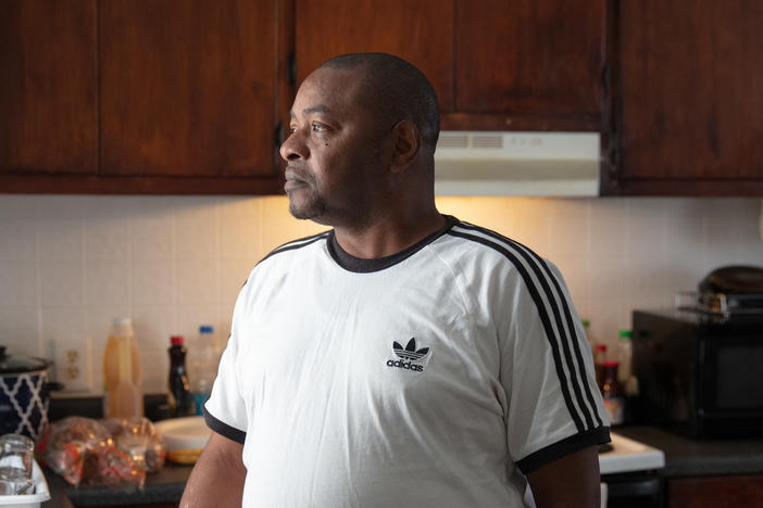 Eric Perkins says the kitchen is what sold him on the two-bedroom, one-bathroom apartment in Norfolk, Va., that he found through a shared housing program.