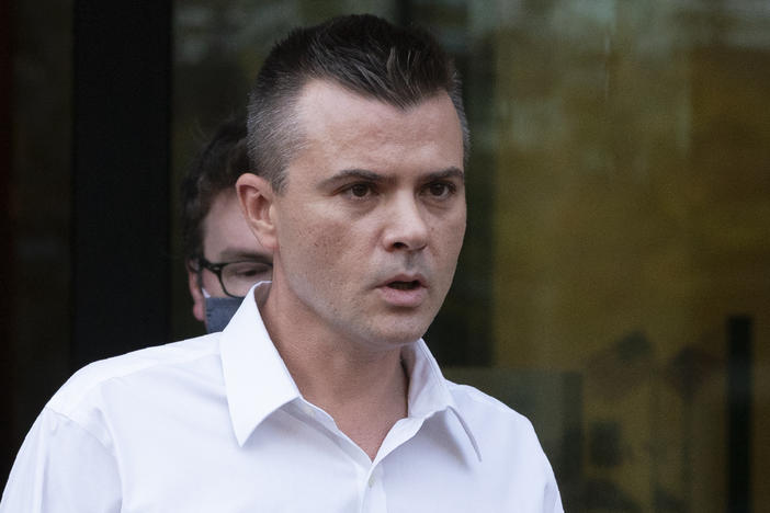 Igor Danchenko leaves the federal courthouse in Alexandria, Va., on Nov. 4, 2021. On Tuesday, a jury acquitted the think tank analyst of charges that he lied to the FBI about his role in the creation of a discredited dossier about former President Donald Trump.