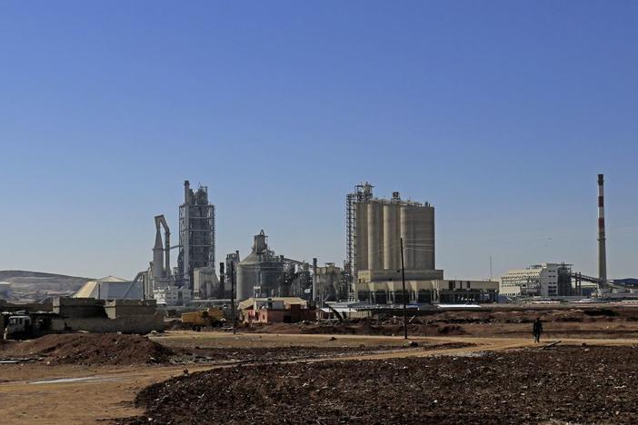 Lafarge SA paid a nearly $800 million fine over its payments to terrorist groups in Syria in order to keep its cement plant (pictured) in Jalabiya, northern Syria, working.