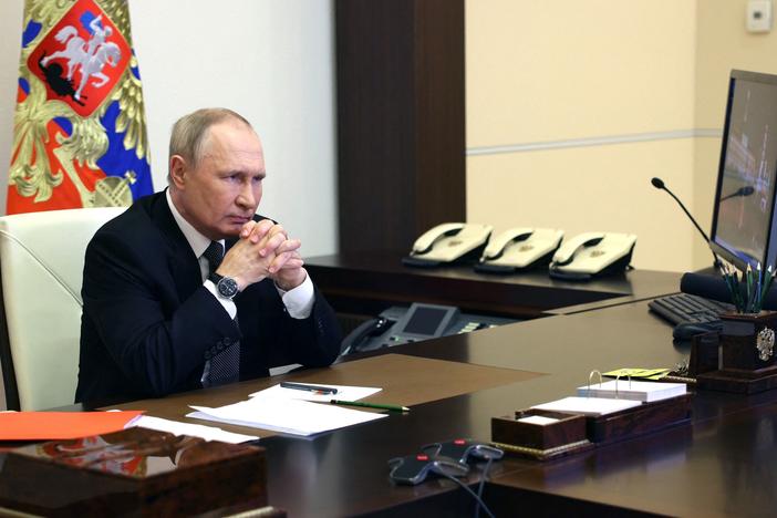 Russian President Vladimir Putin chairs a Security Council meeting via a video link at the Novo-Ogaryovo state residence outside Moscow on Wednesday. Putin introduced martial law in Ukraine's Donetsk, Luhansk, Kherson and Zaporizhzhia regions that Moscow claims to have annexed.