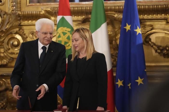 Italian President Sergio Mattarella is flanked by newly appointed Italian Premier Giorgia Meloni during the swearing in ceremony in Rome on Saturday.