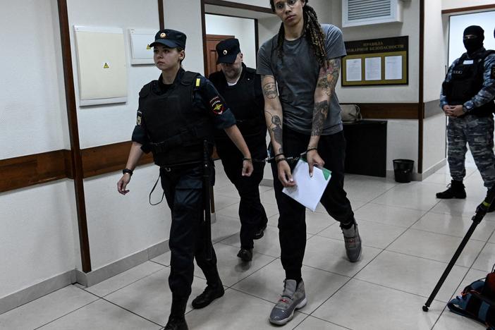 Women's National Basketball Association player Brittney Griner leaves the courtroom after the verdict in Khimki, outside Moscow, on Aug. 4. A Russian court found Griner guilty of smuggling and storing narcotics.