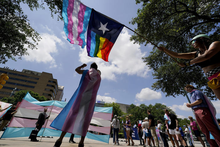 Demonstrators gather on the steps to the Texas State Capitol in Austin to speak against transgender-related bills being considered in the state legislature in May 2021.