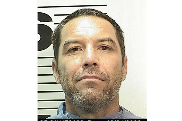 A new mug shot taken Friday shows Scott Peterson, 50, with salt-and-pepper stubble compared to his previous clean-shaven look.
