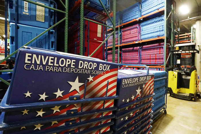 The warehouse at the Maricopa County Elections Department is seen on Sept. 8. The Maricopa sheriff says he's stepped up security around ballot drop boxes after a series of incidents involving people keeping watch on the boxes.