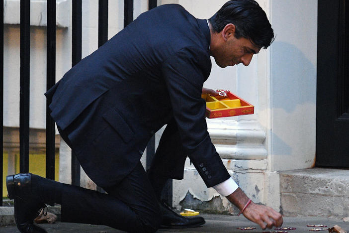 Rishi Sunak lights a candle for Diwali in Downing Street in 2020.