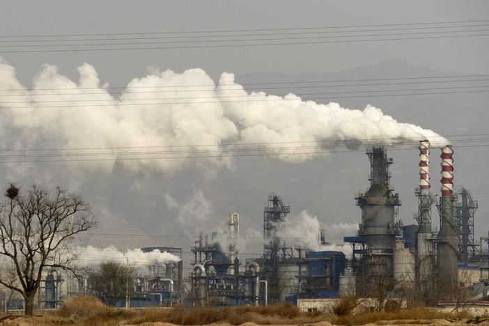 Coal power has resurged since the pandemic, like at this coal processing plant in China's Shanxi Province, but research shows it should be phased out by 2030 to avoid extreme climate change.