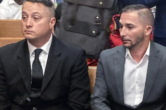 Jacob Runyan (left) and Chase Cominsky pleaded not guilty to cheating and other felonies Wednesday, related to a lucrative fishing tournament on Lake Erie where they were accused of stuffing five walleye fish with lead weights and fish filets.