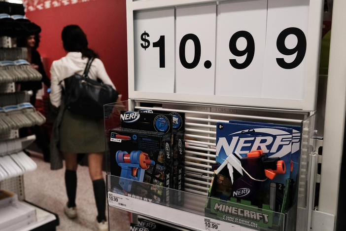 People shop in a Manhattan store on Oct. 26, 2022 in New York City. Inflation, in the form of higher prices for gas, food and other consumer goods is weighing on U.S. economic growth.