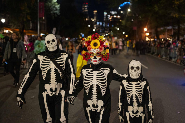 Halloween revelers dressed in costumes march in New York City's 48th annual Greenwich Village Halloween Parade, Sunday, Oct. 31, 2021, in New York.