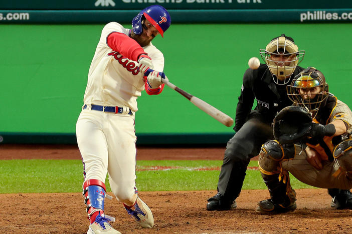 Phillies slugger Bryce Harper hits the series winning two-run homerun during the 8th inning against the San Diego Padres in game 5 of the National League Championship in Philadelphia on Oct. 23, 2022.