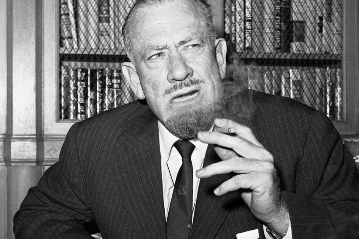 John Steinbeck talks to media in the office of his publisher in New York on Oct. 25, 1962.