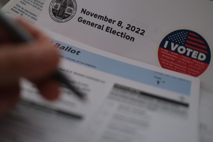 In this illustration photo, a voter fills out their ballot n Los Angeles on Monday.