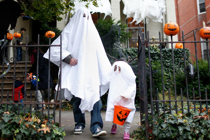 A family goes trick or treating in Fort Greene, Brooklyn, in 2012.