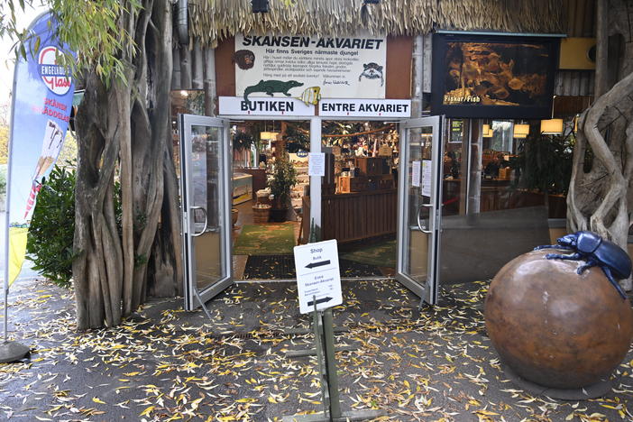 The Skansen Aquarium's entrance, part of the zoo on Djurgarden island, where a deadly snake escaped on Saturday via a light fixture in the ceiling of its glass enclosure, in Stockholm, Sweden, on Monday.