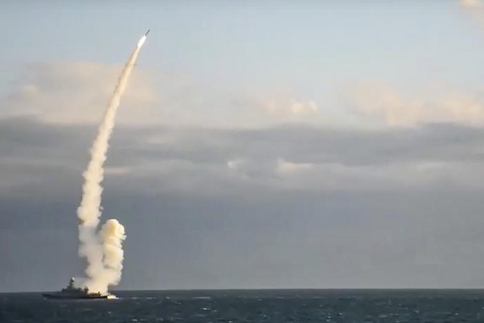 A Russian warship launches a cruise missile at a target in Ukraine on Monday. A massive barrage of Russian strikes hit critical infrastructure in Kyiv, Kharkiv and other Ukrainian cities on Monday morning, knocking out water and power supplies in apparent retaliation for what Moscow alleged was a Ukrainian attack on its Black Sea Fleet over the weekend.