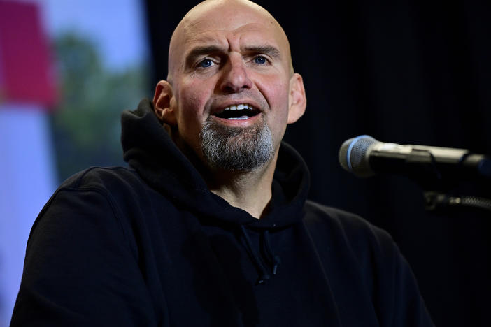 Democratic candidate for U.S. Senate John Fetterman holds a rally last month in Wallingford, Pa.
