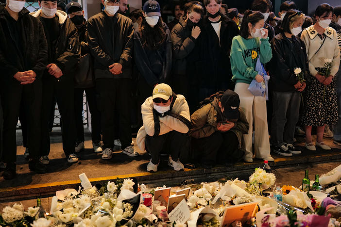 Mourners in the Itaewon neighborhood of Seoul pay tribute Monday to the victims of a deadly crowd crush that took place during Halloween celebrations Saturday night.