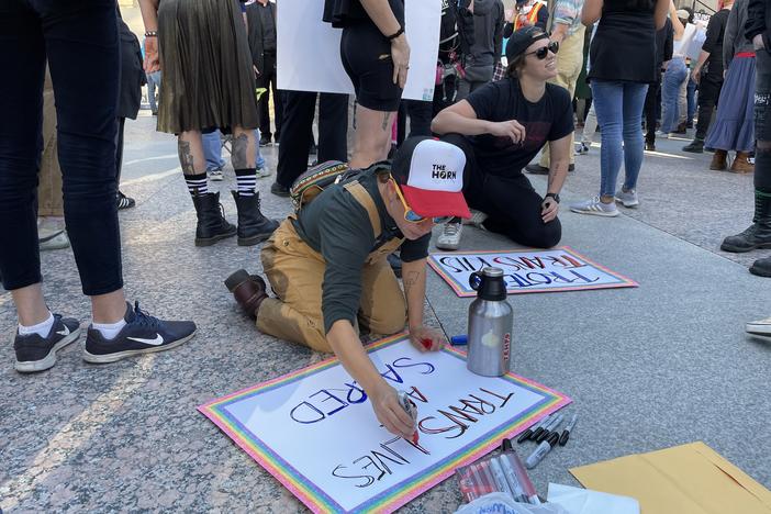 Dozens of counter-protesters attempted to disrupt an anti-trans rally outside the Tennessee capitol building on October 21 with signs, sirens and shouting.