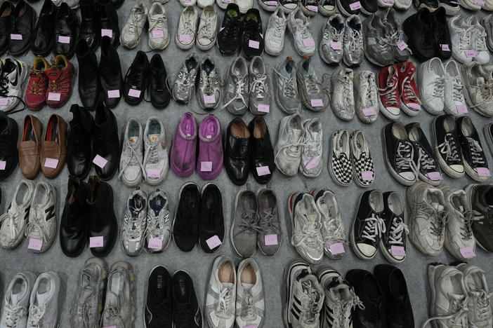 Shoes are seen at a temporary lost and found center in Seoul on Tuesday. They were among a huge collection of items found following Saturday night's deadly crowd surge.