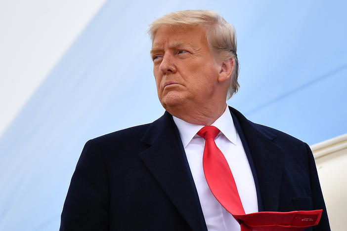 Then-President Donald Trump boards Air Force One before departing Harlingen, Texas on Jan. 12, 2021.