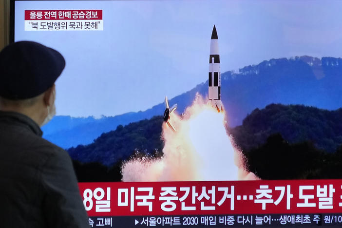 A TV screen shows a file image of North Korea's missile launch during a news program at the Seoul Railway Station in Seoul, South Korea, Wednesday, Nov. 2, 2022.