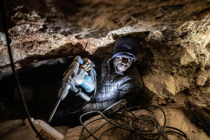 Jefferson Ncube, an illegal diamond miner from Zimbabwe, works on his latest tunnel at an abandoned De Beers mine near Kleinzee, South Africa. Ncube is a univeristy graduate, but has been unable to find employment.