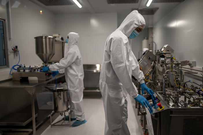 Afrigen Biologics staff members in the company's lab in Cape Town, South Africa. Afrigen is working on a project to figure out how to manufacture the Moderna COVID-19 vaccine â part of an effort to address global health inequities.