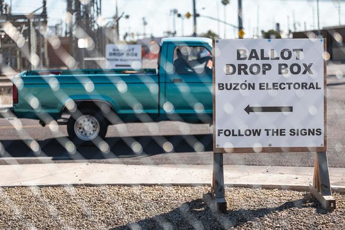 Fences surround the Maricopa County Tabulation and Elections Center (MCTEC) in Phoenix, Arizona, on Oct. 25, 2022, to help prevent incidents and pressure on voters at the ballot drop box.