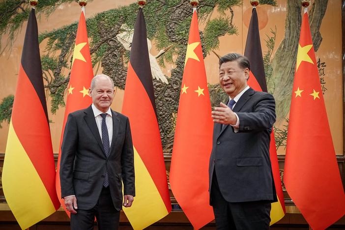 Chinese President Xi Jinping, right, welcomes German Chancellor Olaf Scholz at the Great Hall of the People in Beijing on Friday.