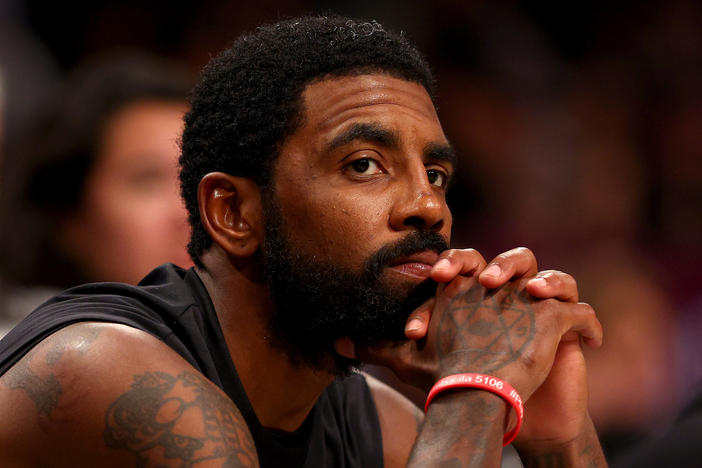 Brooklyn Nets guard Kyrie Irving is facing a number of actions after he tweeted a link to an antisemitic film.