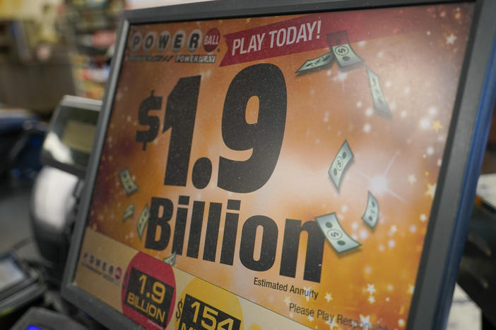 The display panel advertising the tickets for the Monday Powerball drawing with an annuity value of at least $1.9 billion, are shown at a convenience store, Monday, Nov. 7, 2022, in Renfrew, Pa.