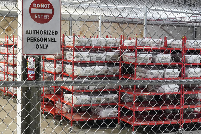 Mail-in ballots sit in a secure area of the Allegheny County Election Division warehouse in Pittsburgh on Nov. 3. Pennsylvania state law does not allow election officials to start processing mail ballots for counting until 7 a.m. ET on Election Day.