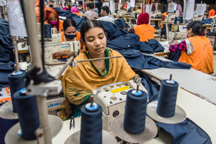 Women manufacture clothes in Dhaka, Bangladesh on Aug. 29. The ready-made garment (RMG) industry in Bangladesh is now a mainstay of the country's economy. Today, Bangladesh is one of the world's largest garment exporters, with the sector accounting for more than 80% percent of Bangladesh's exports.