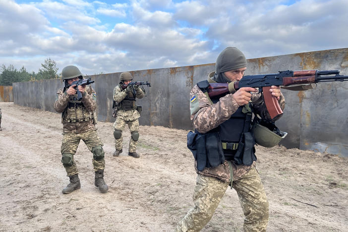 Ukrainian infantry soldiers go through training exercises at a military camp outside Dnipro, Ukraine, on Oct. 24. Official "morale officers" watch over the soldiers, keeping them focused on the fight, addressing any problems quickly and not letting them fester inside, which can be dangerous on the battlefield.