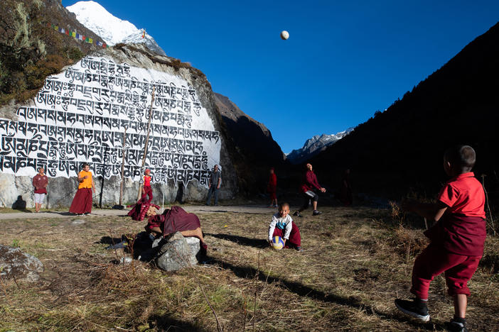 Students at the Rolwaling Sangag Choling Monastery School in Beding take a break to play volleyball in the afternoon sun.