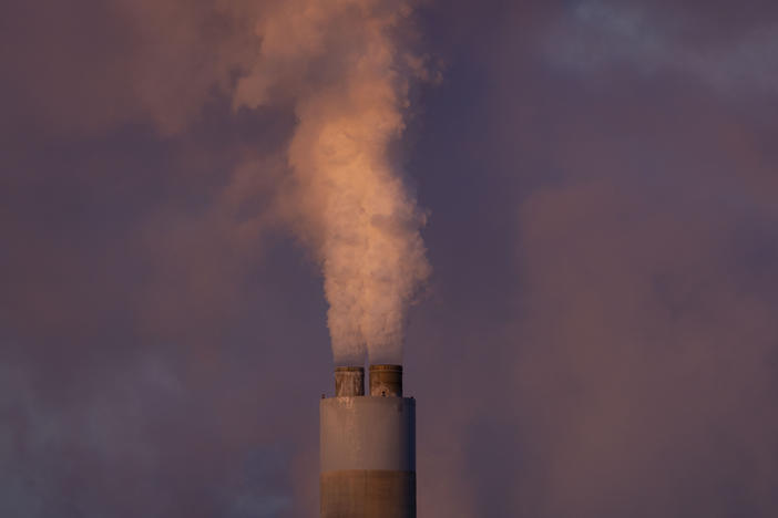 Carbon dioxide and other pollutants billows from a stack at PacifiCorp's coal-fired Naughton Power Plant, near where Bill Gates company, TerraPower plans to build an advanced, nontraditional nuclear reactor, Thursday, Jan. 13, 2022, in Kemmerer, Wyo.