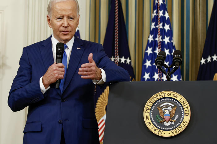 President Biden takes questions from reporters at the White House on Wednesday.