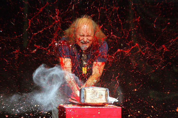 Comedian Gallagher smashes strawberry syrup and flour at the end of his performance at the Five Flags Theater in Dubuque, Iowa, on Nov. 18, 2006.