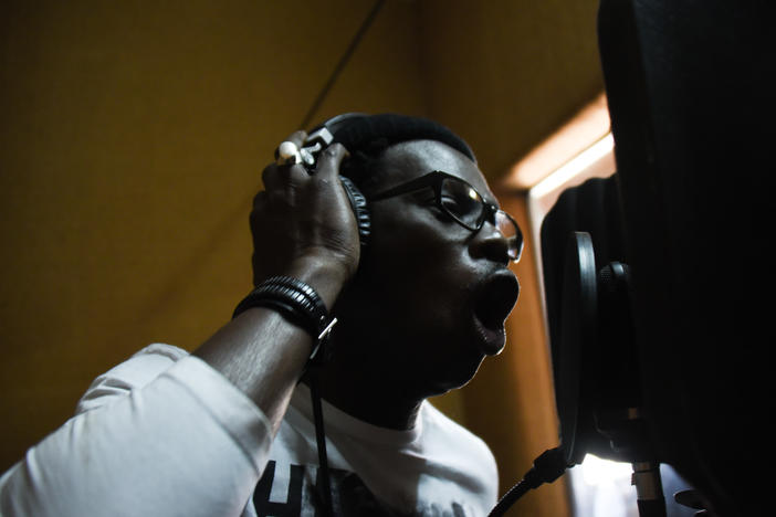 Babacar Niang, known as Matador, raps at a recording studio at one of Africulturban's facilities in Pikine, Senegal on April 26, 2018.