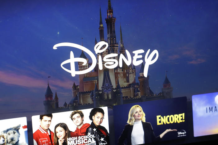 In this Wednesday, Nov. 13, 2019, file photo, a Disney logo forms part of a menu for the Disney Plus movie and entertainment streaming service on a computer screen in Walpole, Mass.