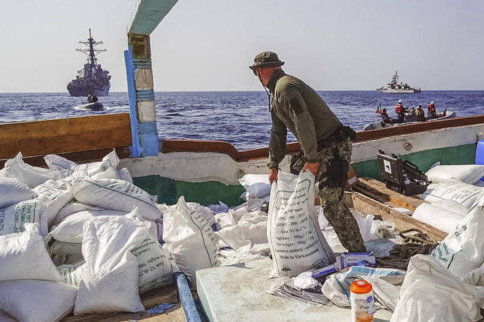 Sailors inventory urea and ammonium perchlorate found on a dhow intercepted in the Gulf of Oman. The U.S. Navy says it found 70 tons of a missile fuel component hidden among bags of fertilizer aboard a ship bound to Yemen from Iran.