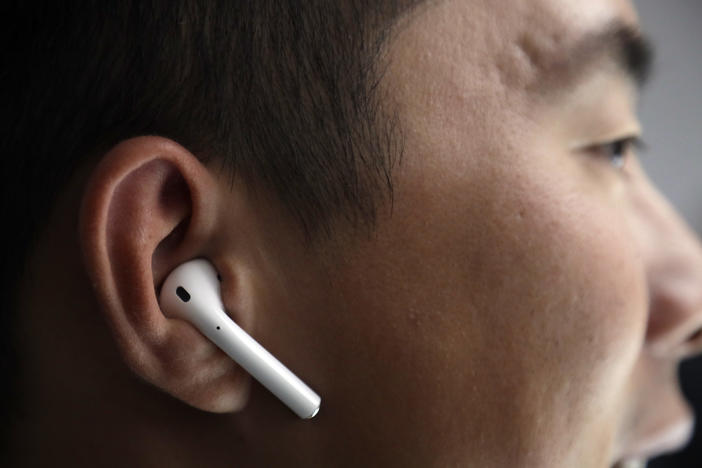 Apple AirPods are demonstrated during an event to announce new products on Wednesday, Sept. 7, 2016, in San Francisco.