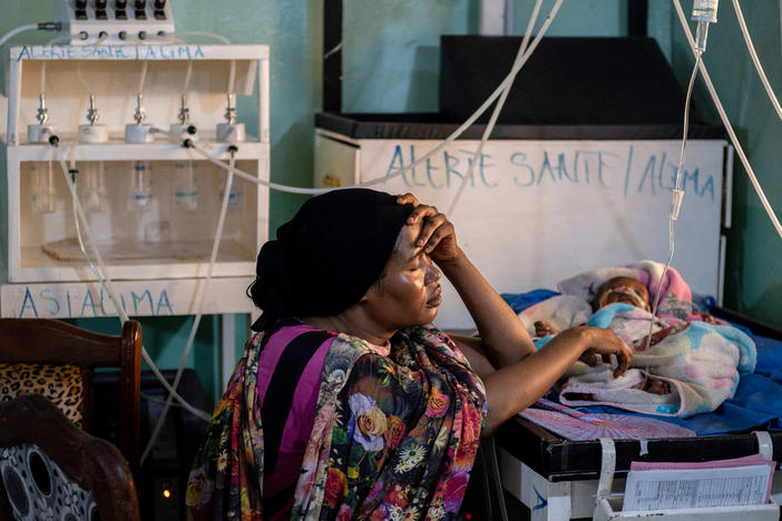 Zania Muhammed comforts her malnourished son, Mazzam Brahim, in the emergency section for critical care patients at a hospital in N'djamena, Chad. The war in Ukraine has caused food prices to skyrocket, leaving many without enough to eat.